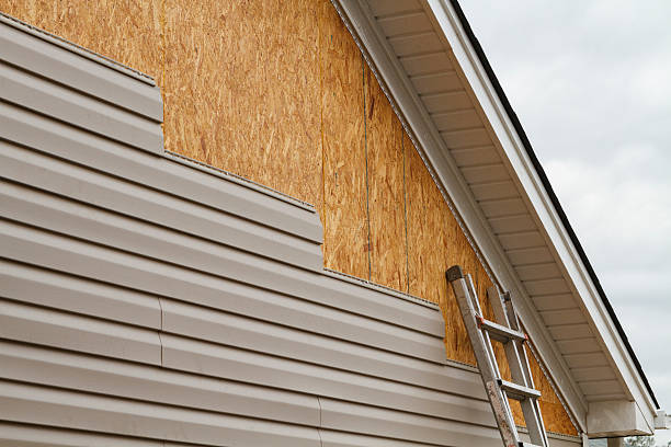 Professional Siding technician working in Diggs, VA